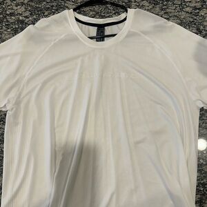 Alphalete Spandex/ Polyester type shirt